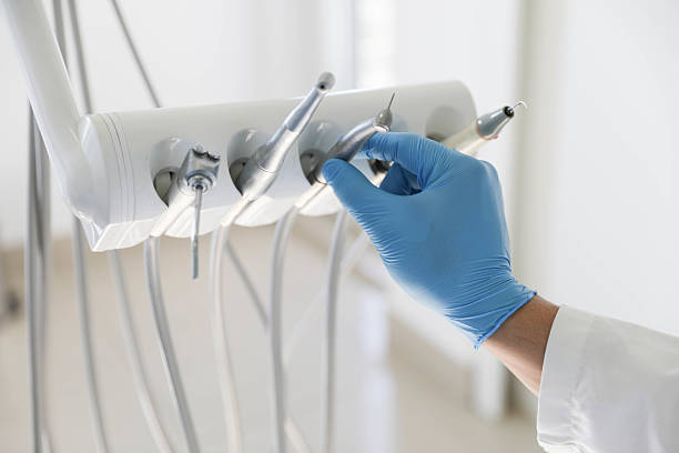 Professional Tooth Extraction technician working in Wilsonville, OR